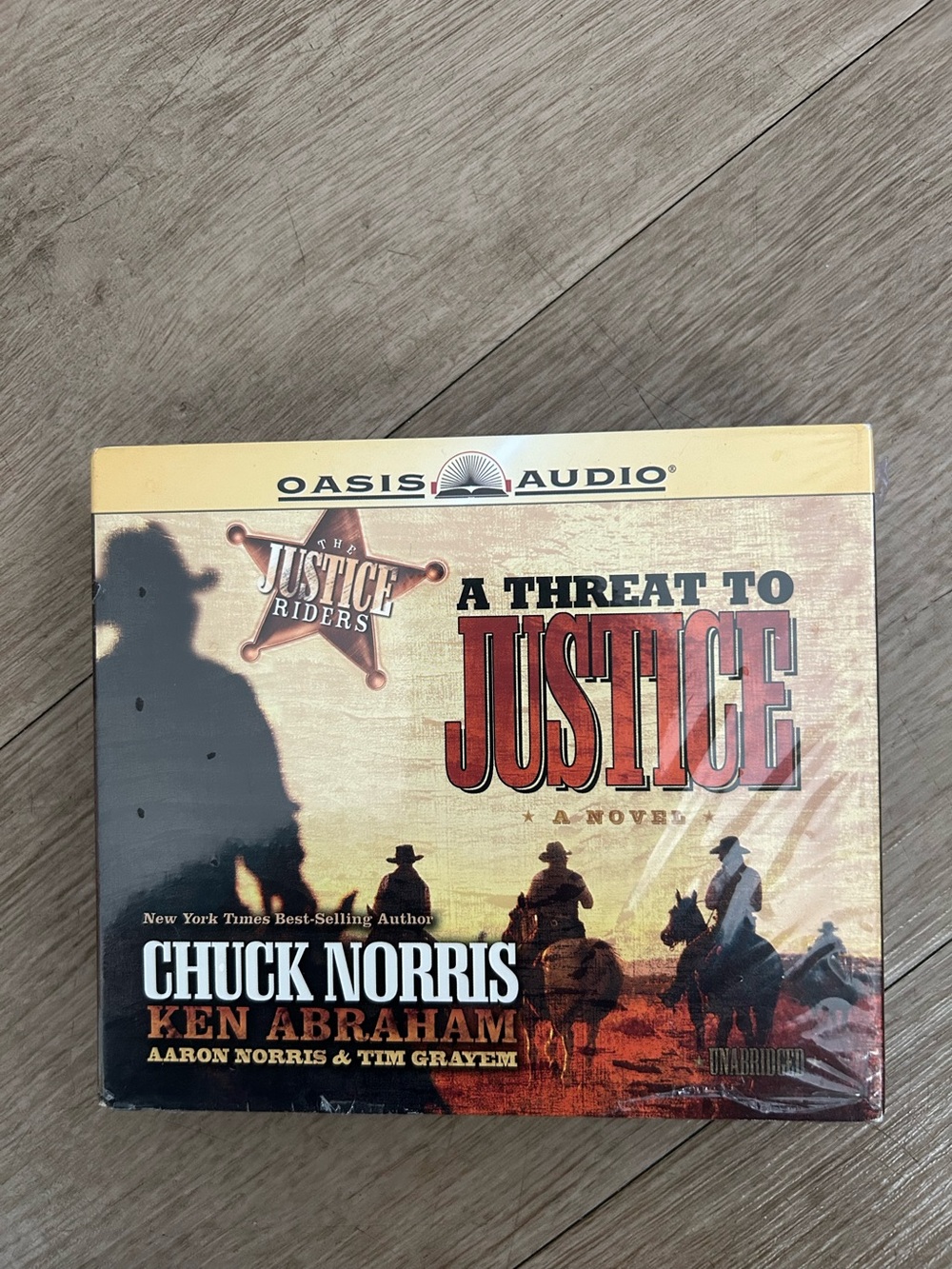 Chuck Norris "A Threat to Justice" Audio Book - Tan & Brown Cover